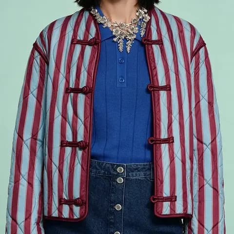 Quilted striped jacket, cropped from the generated photo